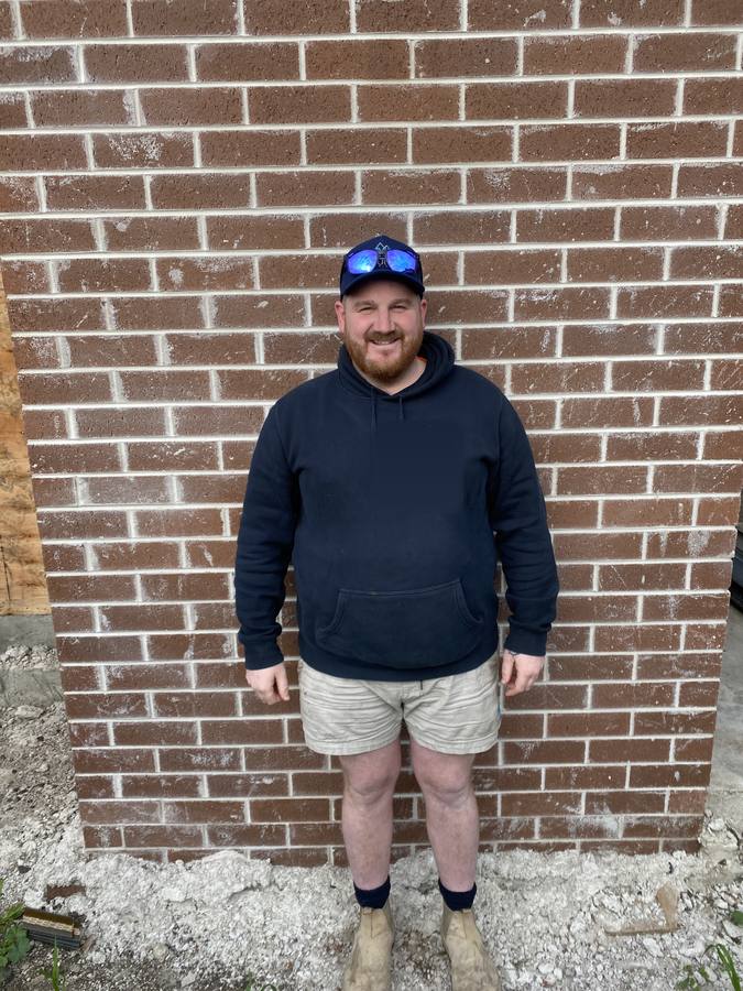 Josh, founder of ReviewLoop, on a job site